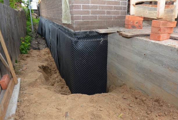 Happy homeowners after waterproofing job in Whitestown
